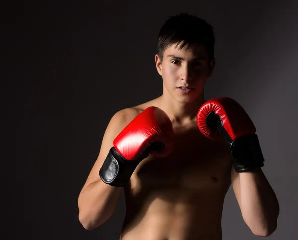 files/depositphotos_29948609-stock-photo-young-male-kickboxer.webp