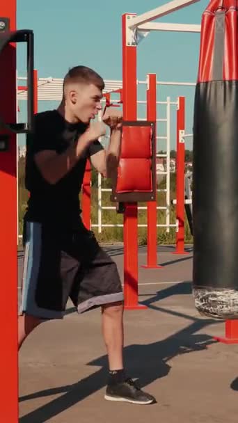 files/stock-video-young-boxer-hitting-punching-bag-muscular-man-engaged-boxing-punching.jpg